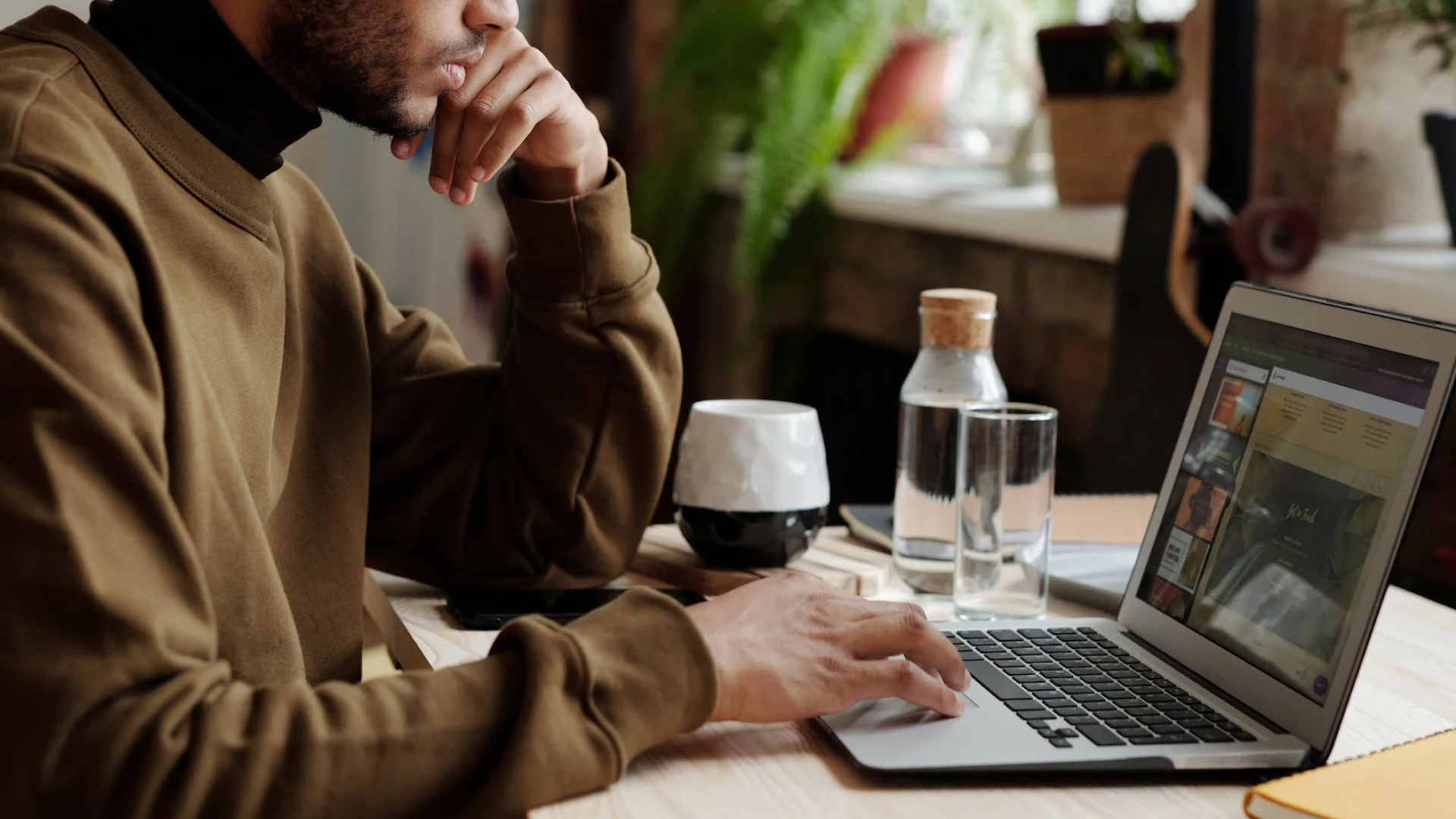 UX designer working on their laptop.