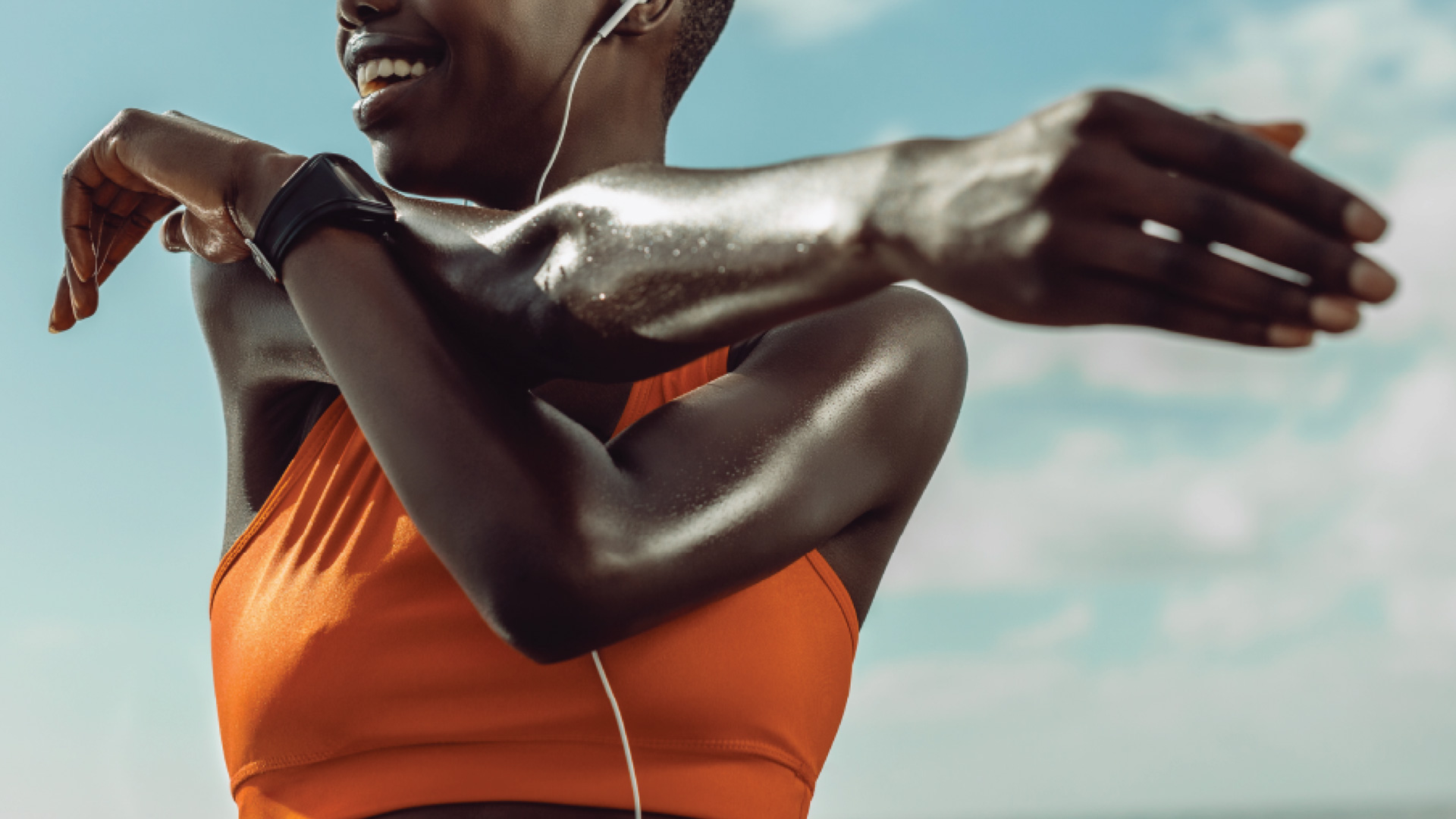 Vitality Health International Lifestyle image of woman happily stretching.